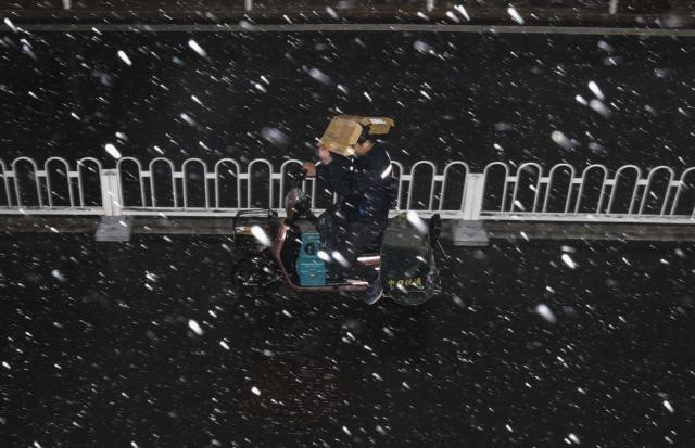 Sau 30 năm, Bắc Kinh lại đón tuyết rơi vào tháng 4